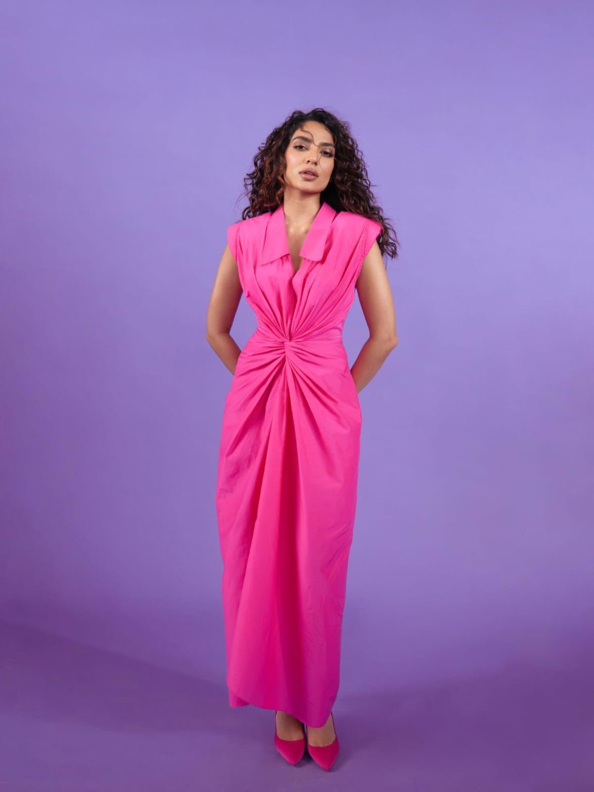 Shobitha  turns heads in a pink ruched dress, showcasing a stylish midsection detail Shobitha  turns heads in a pink ruched dress, showcasing a stylish midsection detail